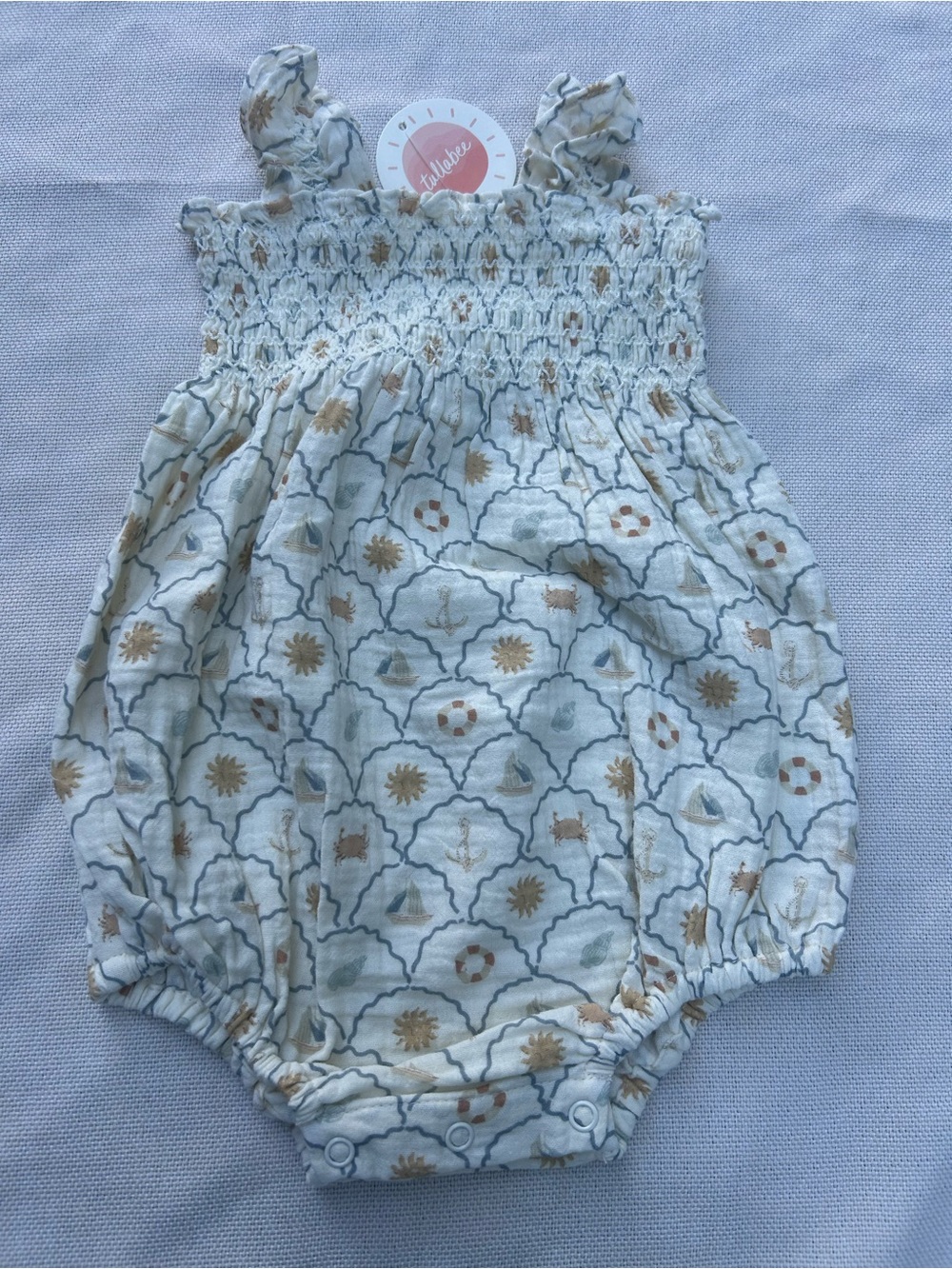 Smocked Baby One-Piece Romper - Cream with Light Blue & Tan Motif